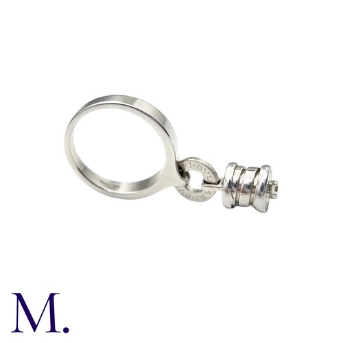 239 - BVLGARI, A Diamond B.zero1 Ring in 18k white gold, set with a dangling B.Zero1 Element, set with a r... 
