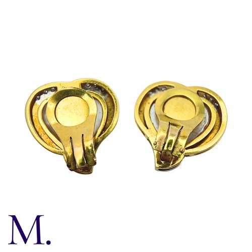 46 - A Pair Of mother of Pearl And Diamond Heart Earrings in 18k yellow gold, comprising heart shape moth... 