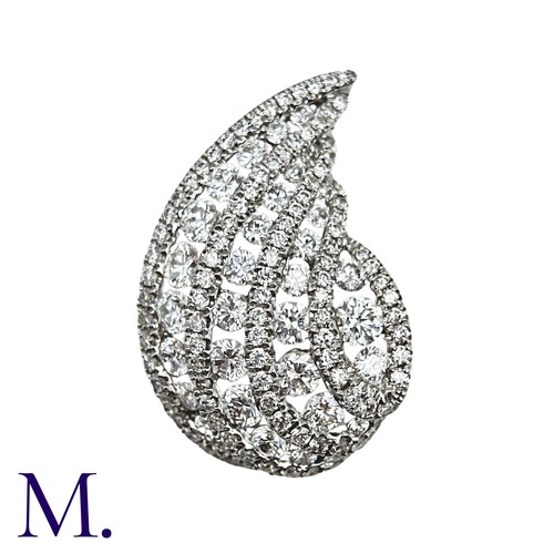 228 - A Diamond Pendant in 18k white gold, the pear shape form set with round cut diamonds. Stamped 750 fo... 