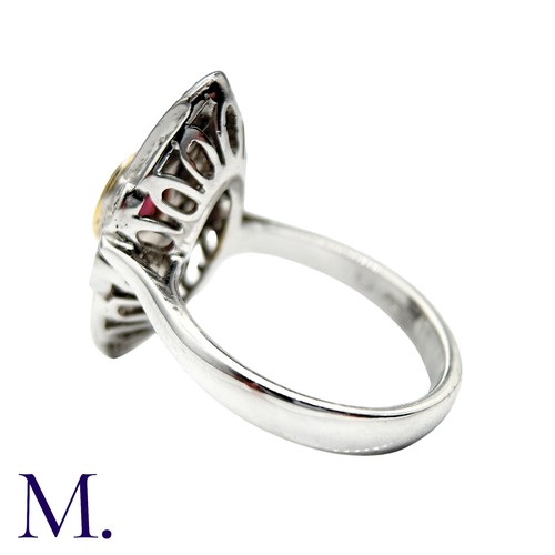 240 - A Ruby And Diamond Dress Ring in 18k white gold, the navette form set with an oval cut ruby and acce... 