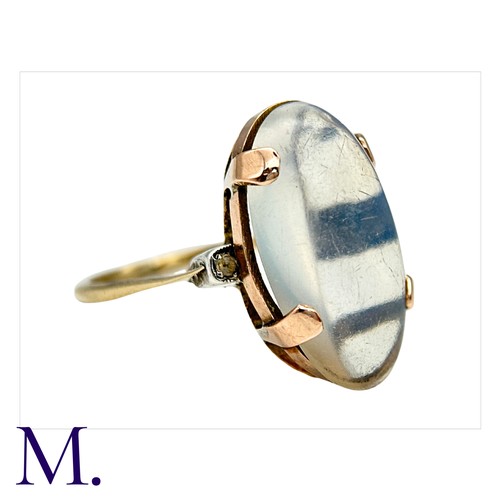 9 - A Moonstone Ring in 9K rose gold, the oval cabochon moonstone approximately 2.0x1.2cm secured with f... 