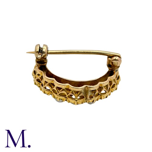 222 - A Pearl And Diamond Crescent Brooch in yellow gold, the crescent form set with alternating pearls an... 