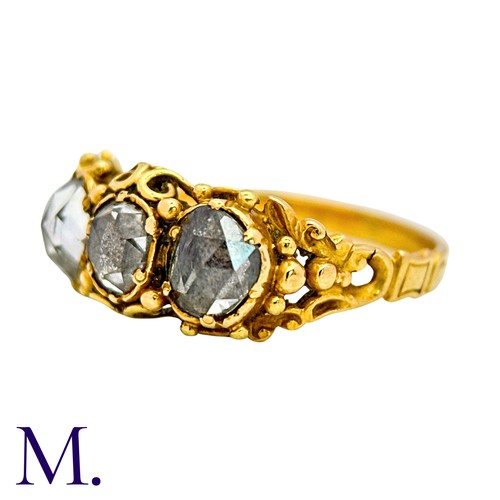 53 - An Antique Rose Cut Diamond Three Stone Ring in yellow gold, set with three rose cut diamonds to an ... 