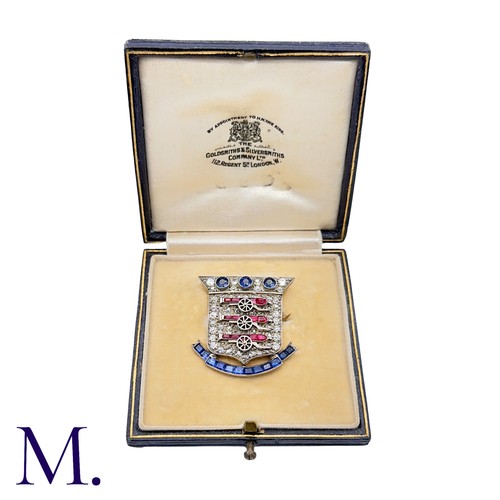 189 - A Royal Ordinance Corps Brooch in yellow gold and platinum, depicting a shield with three cannons ab... 