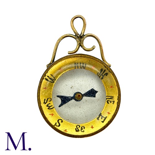 4 - An Antique Compass Pendant in 9k yellow gold, the central compass below a scrolling top. Hallmarked ... 