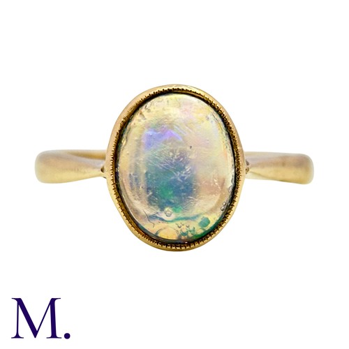 3 - An Opal Ring in 9k yellow gold, set with a cabochon opal. Stamped 9ct.

Size: I1/2
Weight: 1.8g