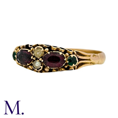 37 - An Antique Garnet, Emerald And Pearl Ring in 15k yellow gold, set with two oval cut garnets accented... 