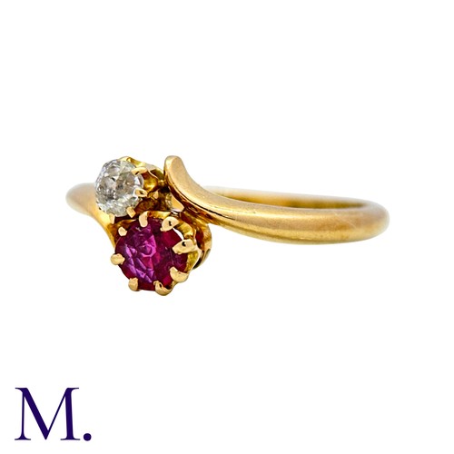 1 - A Ruby And Diamond Toi Et Moi Ring in 18k yellow gold, set with a round cut ruby and an old cut diam... 