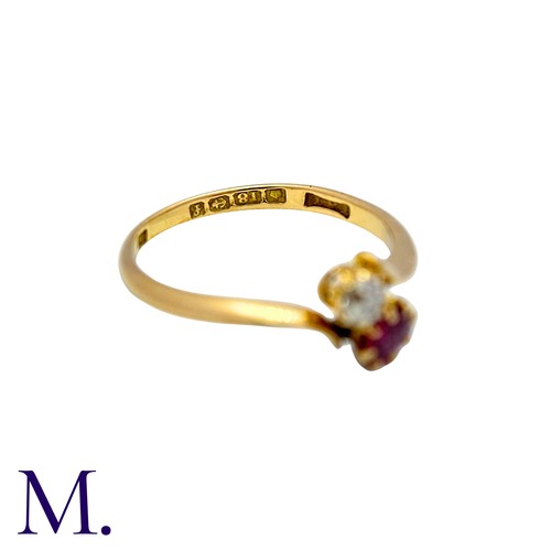 1 - A Ruby And Diamond Toi Et Moi Ring in 18k yellow gold, set with a round cut ruby and an old cut diam... 