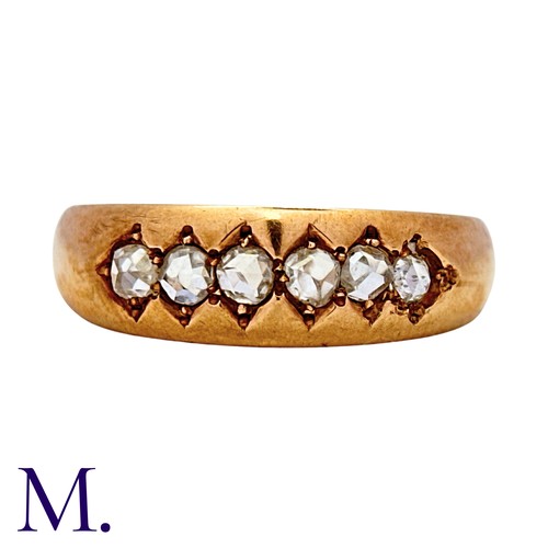 7 - A Diamond Ring in 15k yellow gold, set with six rose cut diamonds. Hallmarked for 15 carat gold.

Si... 