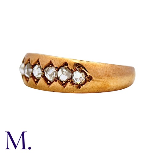 7 - A Diamond Ring in 15k yellow gold, set with six rose cut diamonds. Hallmarked for 15 carat gold.

Si... 