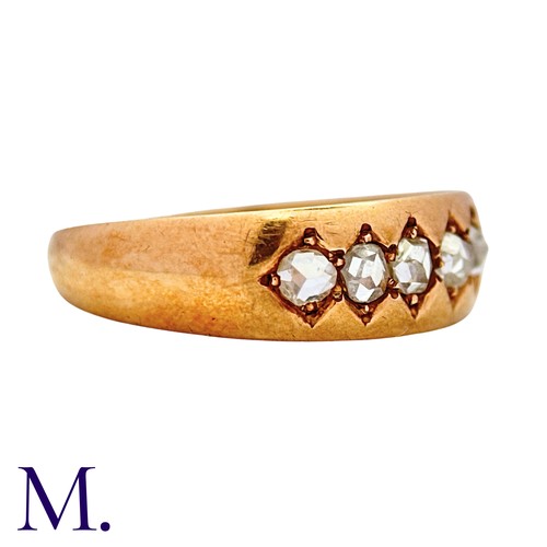 7 - A Diamond Ring in 15k yellow gold, set with six rose cut diamonds. Hallmarked for 15 carat gold.

Si... 