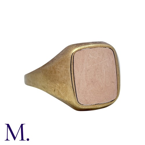 16 - A Masonic Swivel Ring in yellow gold, the signet ring with blue enamel set with gold square and comp... 