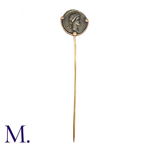 A Pair Of Roman Coin Stick Pins In Yellow Gold, One Set With A Silver 