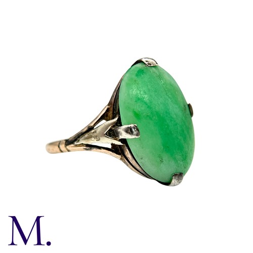 11 - A Jade Ring in 9k yellow gold, set with a cabochon piece of jade. Stamped 9ct.

Size:O1/2
Weight: 3.... 