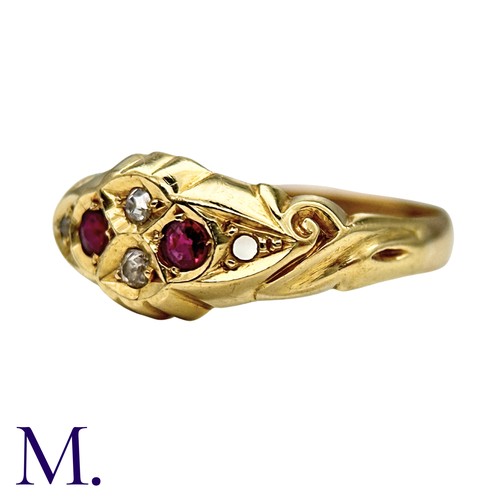 13 - A Ruby And Diamond Ring in 18k yellow gold, set with round cut rubies and round cut and rose cut dia... 