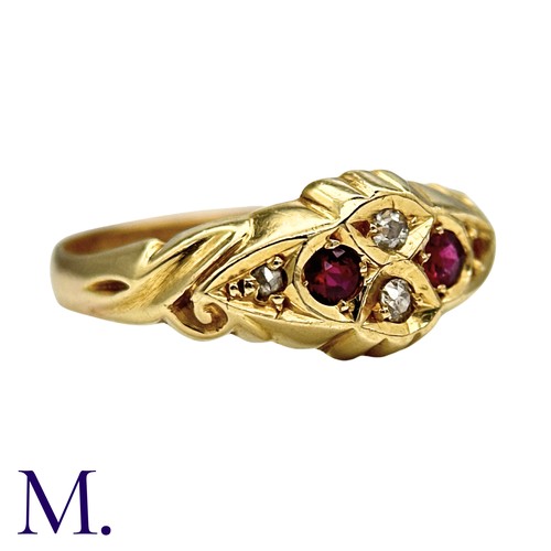 13 - A Ruby And Diamond Ring in 18k yellow gold, set with round cut rubies and round cut and rose cut dia... 