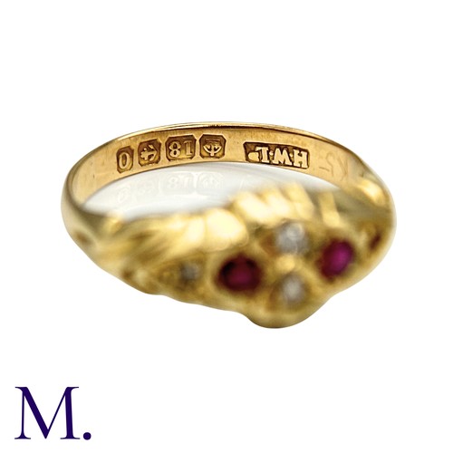 13 - A Ruby And Diamond Ring in 18k yellow gold, set with round cut rubies and round cut and rose cut dia... 