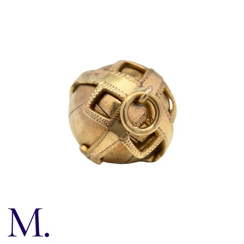 211 - A Masonic Orb Pendant in 9k yellow gold and silver, the hinged spherical body opens to display a cro... 