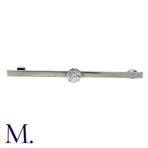 207 - A Diamond Bar Brooch in 9K white gold, set with an old cut diamond weighing approximately 0.35ct to ... 