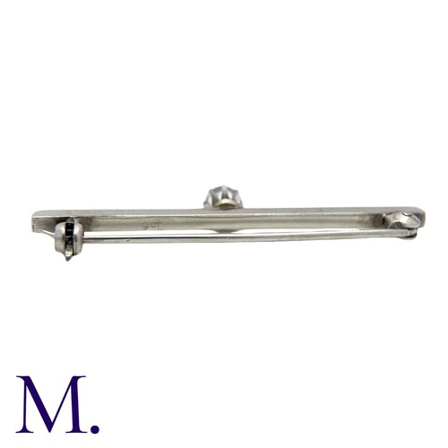 207 - A Diamond Bar Brooch in 9K white gold, set with an old cut diamond weighing approximately 0.35ct to ... 