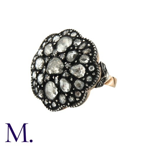 54 - A Rose Diamond Ring in gold and silver. Large silver plaque set with large number of rose cut diamon... 