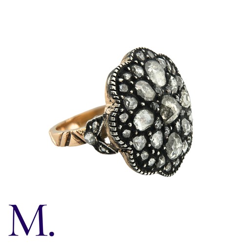 54 - A Rose Diamond Ring in gold and silver. Large silver plaque set with large number of rose cut diamon... 