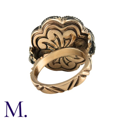 54 - A Rose Diamond Ring in gold and silver. Large silver plaque set with large number of rose cut diamon... 
