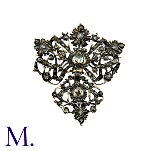 203 - An Antique Rose Diamond Brooch in silver of foliate and bow motif, set with rose cut diamonds. Possi... 
