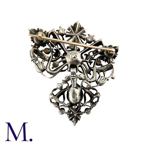203 - An Antique Rose Diamond Brooch in silver of foliate and bow motif, set with rose cut diamonds. Possi... 