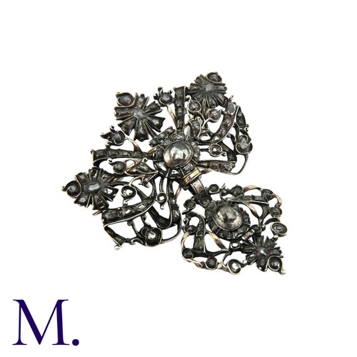 203 - An Antique Rose Diamond Brooch in silver of foliate and bow motif, set with rose cut diamonds. Possi... 