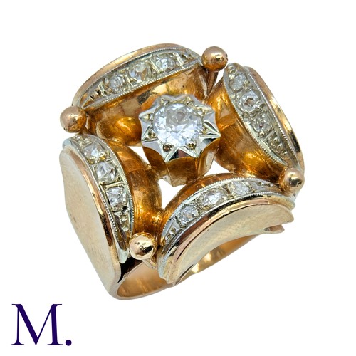 210 - A Diamond Retro Ring in 18K yellow gold, set with a round cut diamond to the centre with rose cut di... 