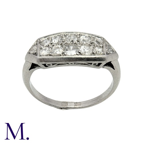 209 - A Diamond Double Row Ring in platinum, set with two rows of diamonds amounting to approximately 0.75... 