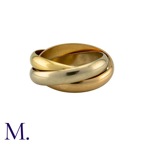 236 - CARTIER. A Cartier Trinity Ring in 18K rose, white and yellow gold.  Engraved 'Les Must de Cartier' ... 
