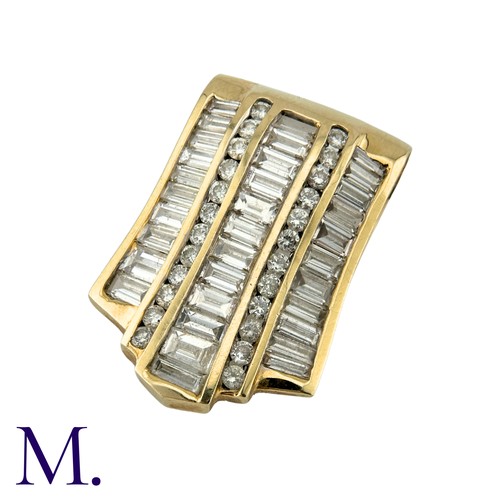 213 - A Diamond Pendant in 14k yellow gold, set with three rows of baguette cut diamonds and two rows of r... 