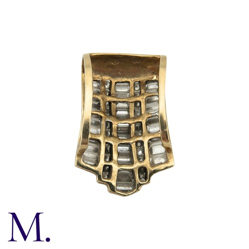 213 - A Diamond Pendant in 14k yellow gold, set with three rows of baguette cut diamonds and two rows of r... 