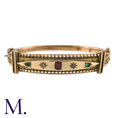 183 - A Victorian Paste Bangle in 9K rose gold, with ropework and beading motifs. Stamped 375 for 9 carat ... 