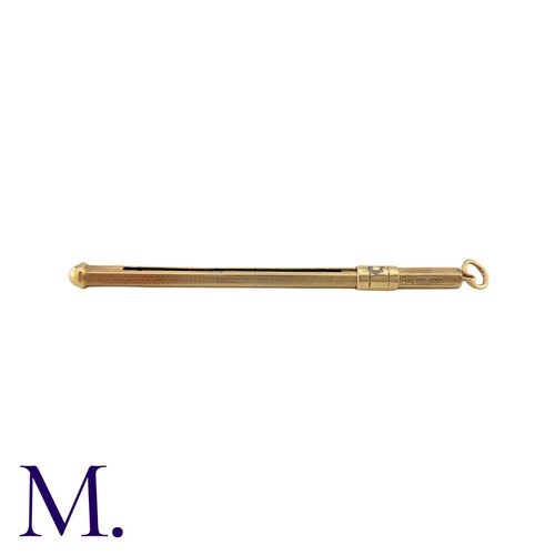 220 - A Gold Cocktail Stirrer in 9K yellow gold with push to open-pull to close function.  Hallmarked for ... 