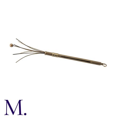 220 - A Gold Cocktail Stirrer in 9K yellow gold with push to open-pull to close function.  Hallmarked for ... 