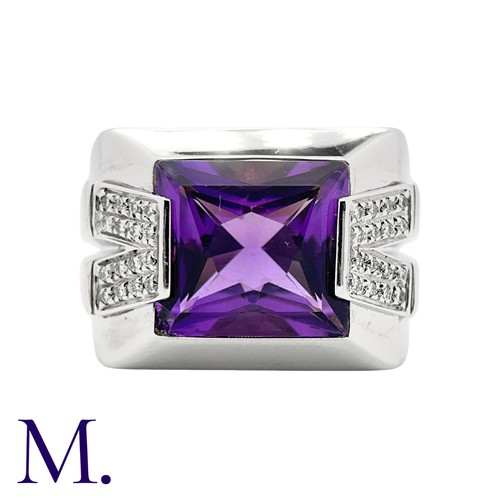 158 - VERSACE. An Amethyst and Diamond Ring in 18K white gold, set with a large fancy faceted-rectangular ... 