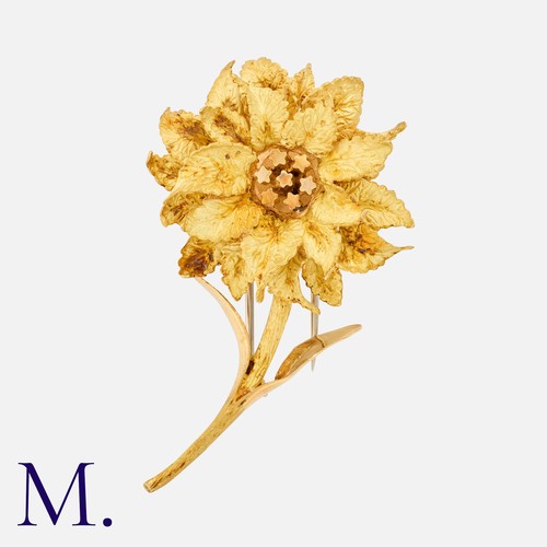 38 - HERMES. A Flower Brooch in 18K yellow gold, signed Hermes Paris and serial numbered.  French marks f... 