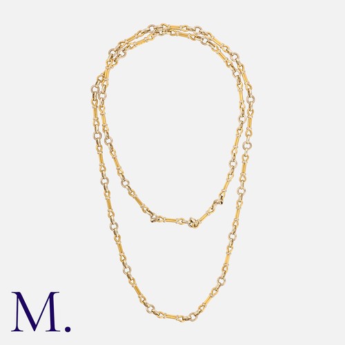 18 - GEORGES LENFANT. A Two-Colour Gold Chain in 18ct yellow and white gold, made up of fancy bar and pla... 