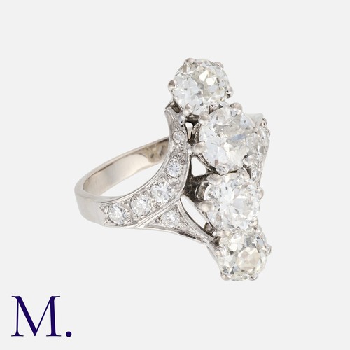 41 - A Diamond 4-Stone Ring in 18K white gold, set with four round-cut diamonds in an off-linear pattern,... 