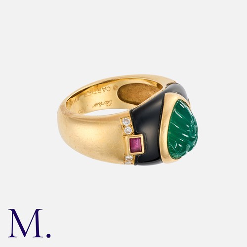 60 - CARTIER. A Chrysoprase, Ruby and Diamond Ring in 18K yellow gold, set with a carved chrysoprase to t... 