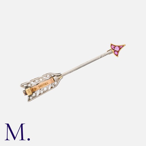 54 - CARTIER , An Art Deco Ruby And Diamond Arrow about Pin in yellow gold and platinum, designed as an a... 