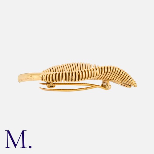 23 - GEORGES LENFANT FOR MAUBOUSSIN. A Gold Leaf Brooch in 18ct yellow gold with tightly woven gold wire ... 