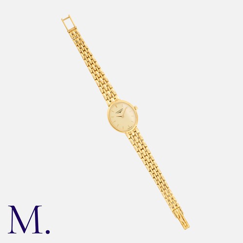 55 - A Prestige Longines Wristwatch in 18K yellow gold, with oval dial, gold hands and markings. Comes wi... 