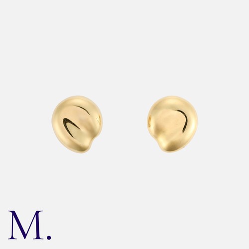 2 - TIFFANY & CO. A Pair of Gold Bean Earclips by Elsa Peretti for Tiffany & Co.  The 18ct yellow gold e... 