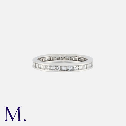 38 - An Asscher Cut Diamond Eternity Ring in platinum, set all around with Asscher cut diamonds. Unmarked... 