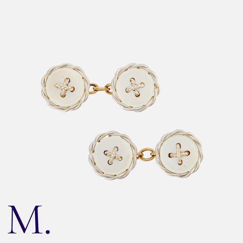 156 - A Pair of Mother of Pearl Cufflinks in 18K yellow gold and platinum.  Front facias set with classic ... 